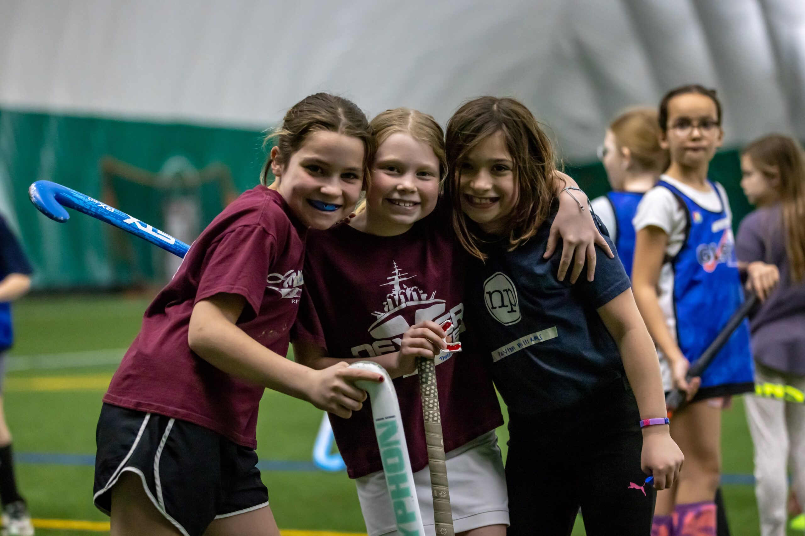 photo of field hockey players participating in a glrfh program