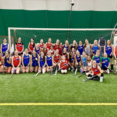 group of youth field hockey players from the midwest